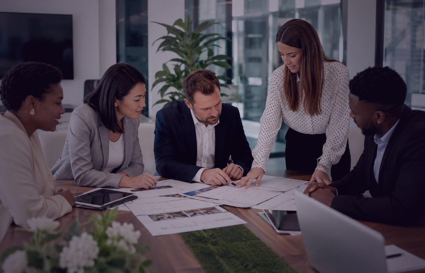 Professional team reviewing event space needs